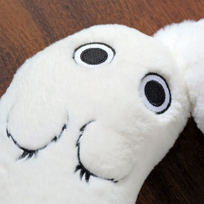 Additional close-up of Brushbuddy neck pillow showing embroidered eyes and paws.