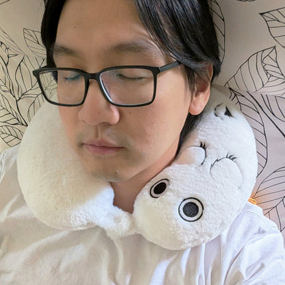 Unpaid model pretending he can afford a vacation with Brushbuddy neck pillow