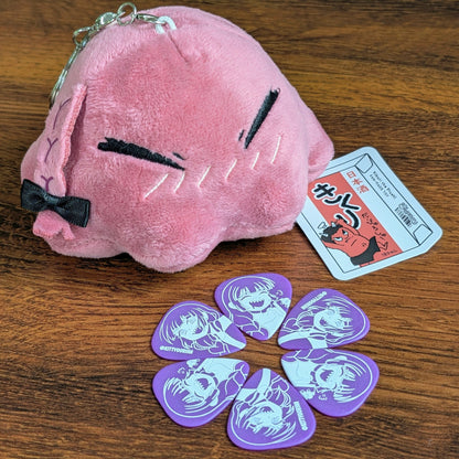 Kikuri Tako Plush with a ring of Kikuri guitar picks